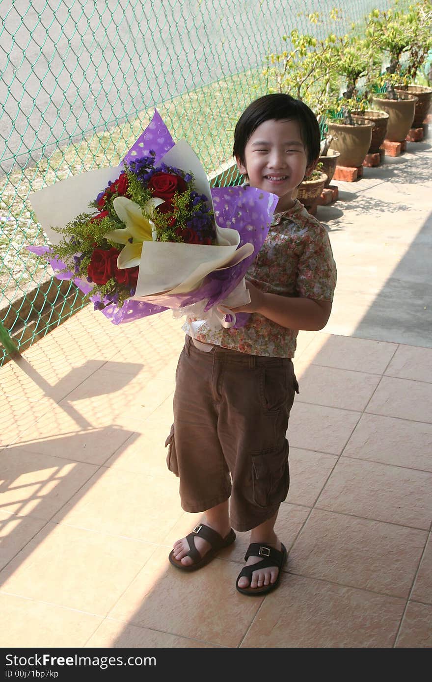 Boy Holding Rose Bouquet