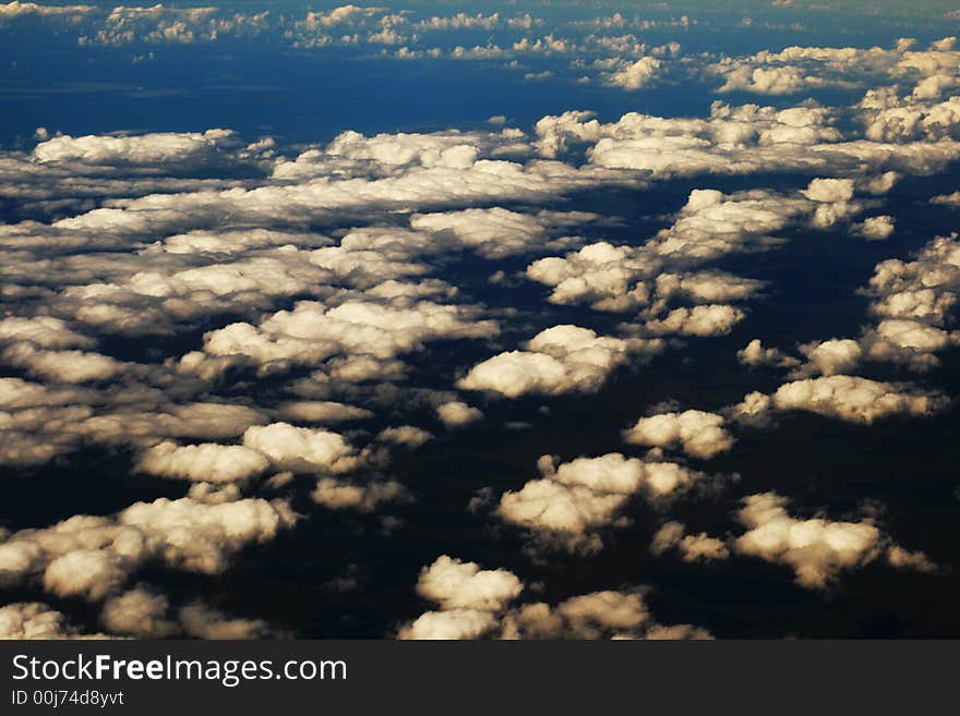 Aerial view on white clouds