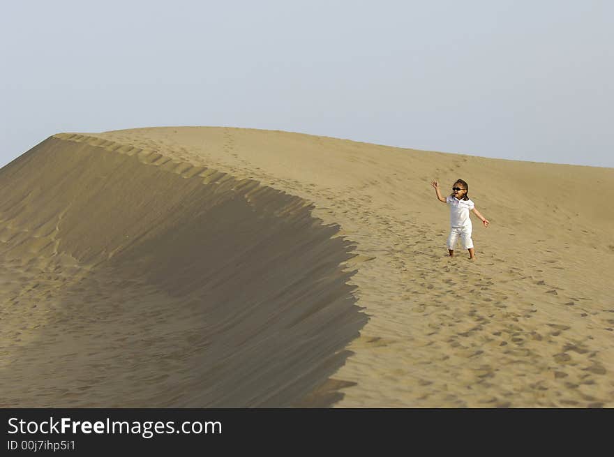 A very happy child in the desert. A very happy child in the desert