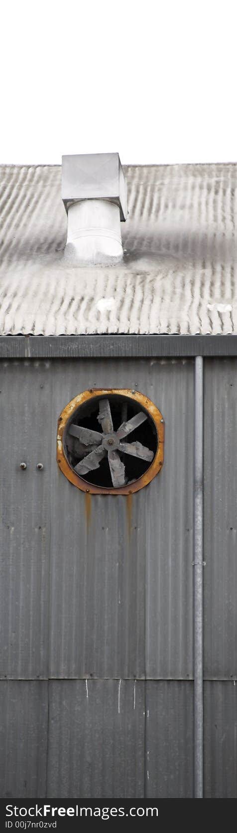 Rusty fan on building in industrial area (1627)