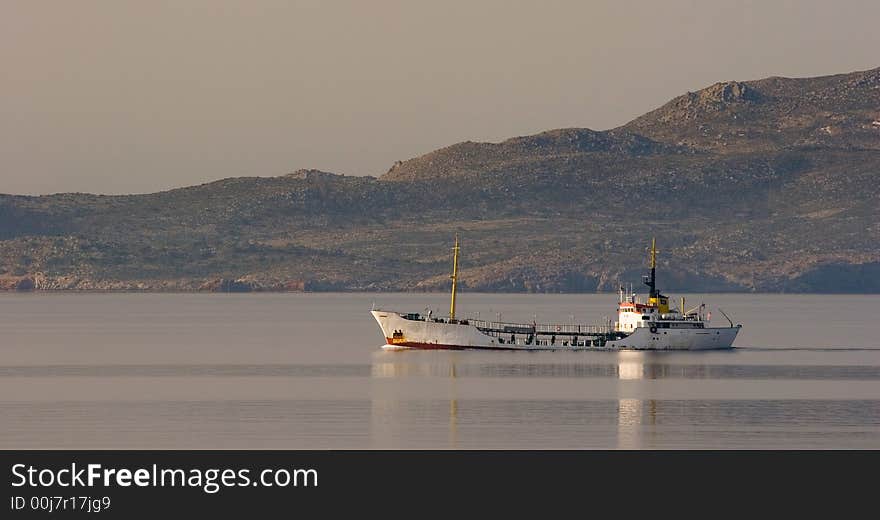 Small old cargo ship, sea. Small old cargo ship, sea