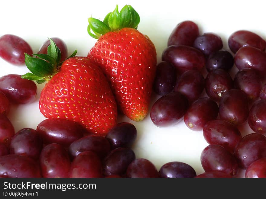 Strawberry couple with grapes