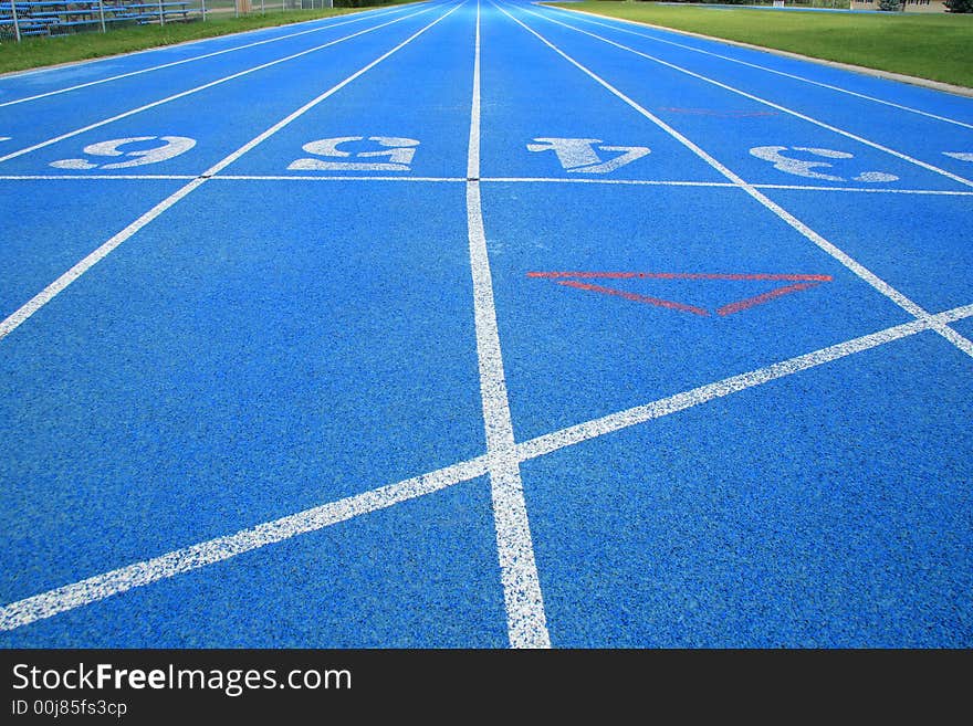 Abstract detail of blue running track. Abstract detail of blue running track.