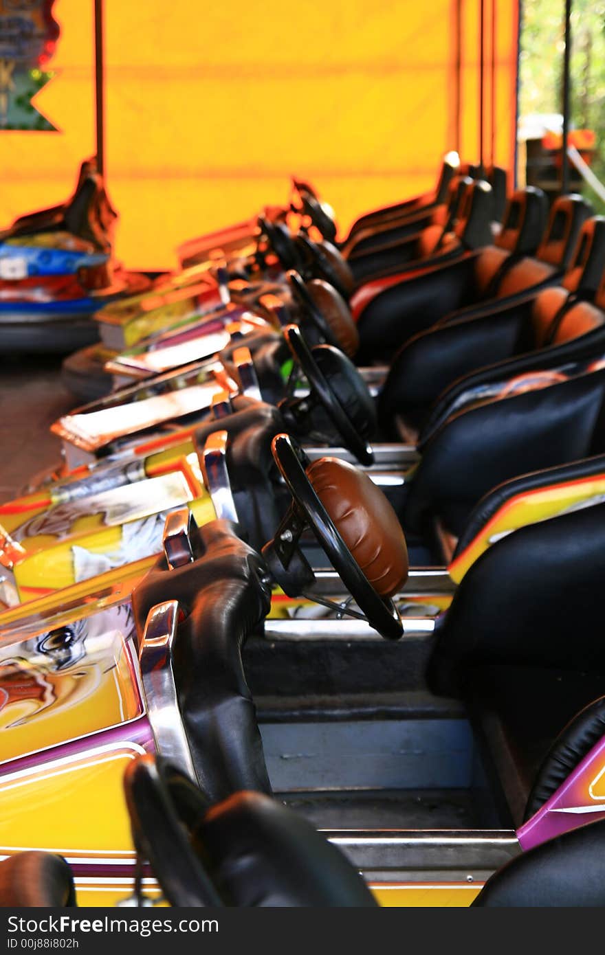 Cars park in amusement park. Cars park in amusement park