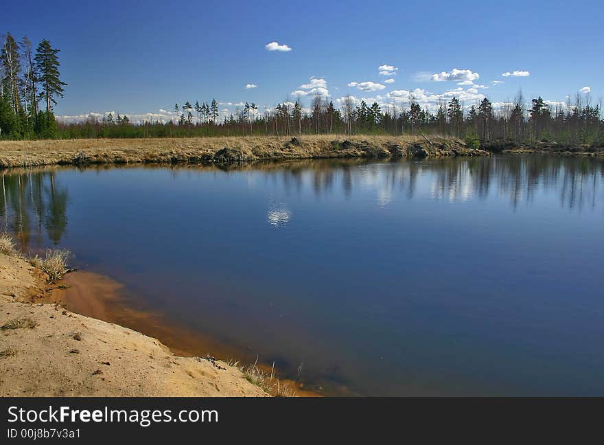 Landscape with blue sky, clouds, forest and lake. Landscape with blue sky, clouds, forest and lake