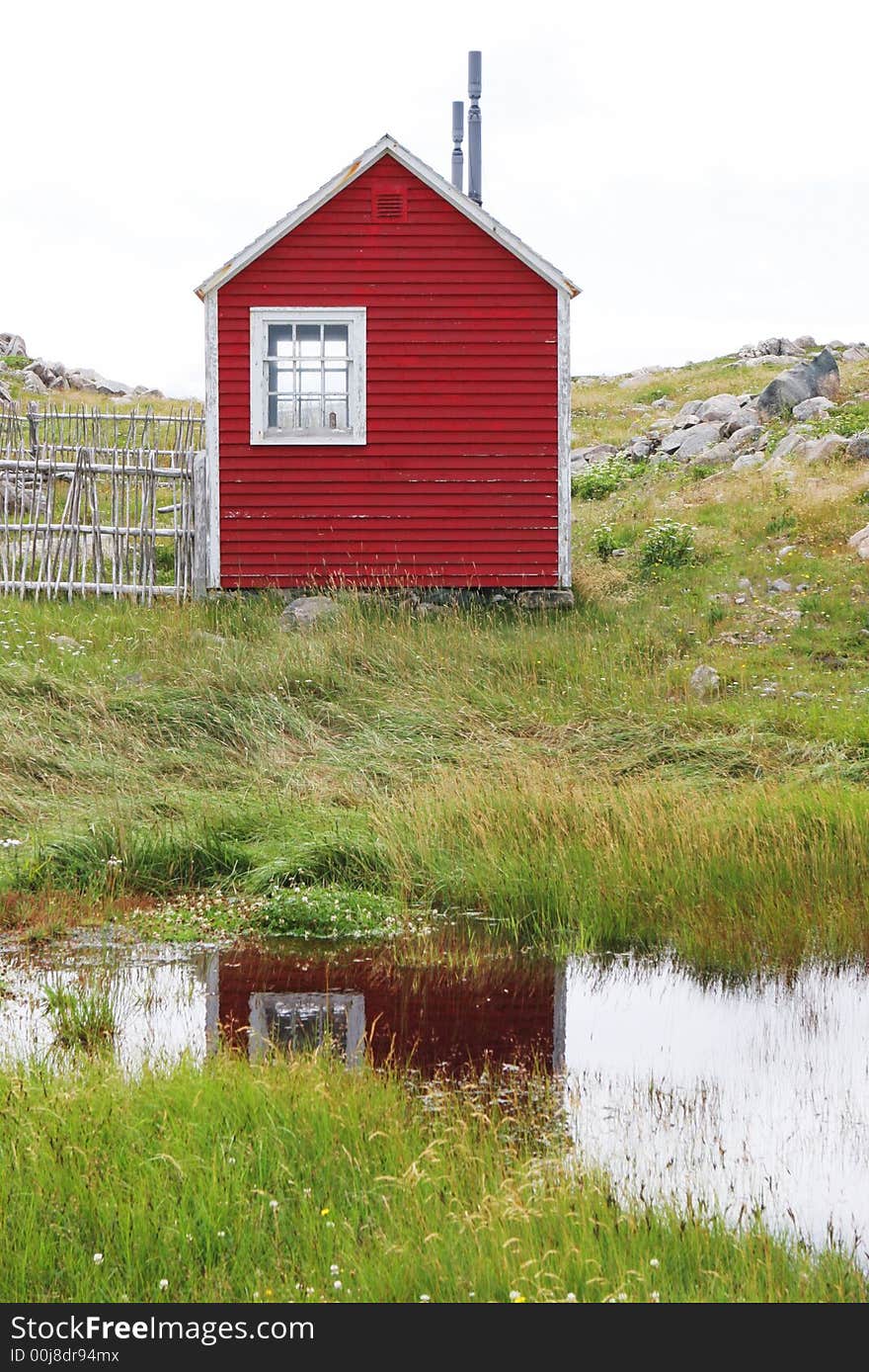 Red building reflected in the