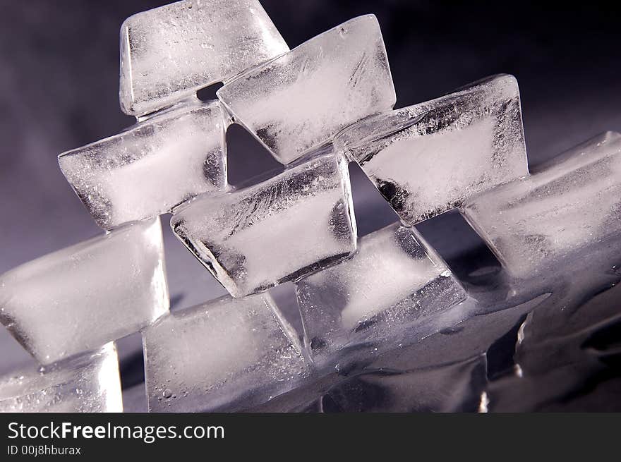 Photo of pyramid made from ice cubes.