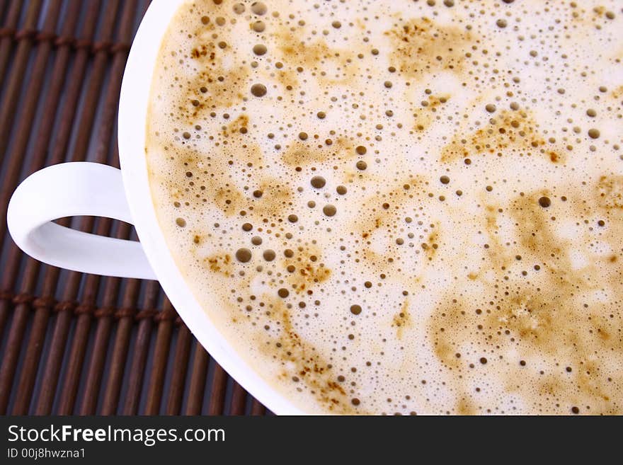 Cup of coffee with chocolate Frothy cappuccino coffee.