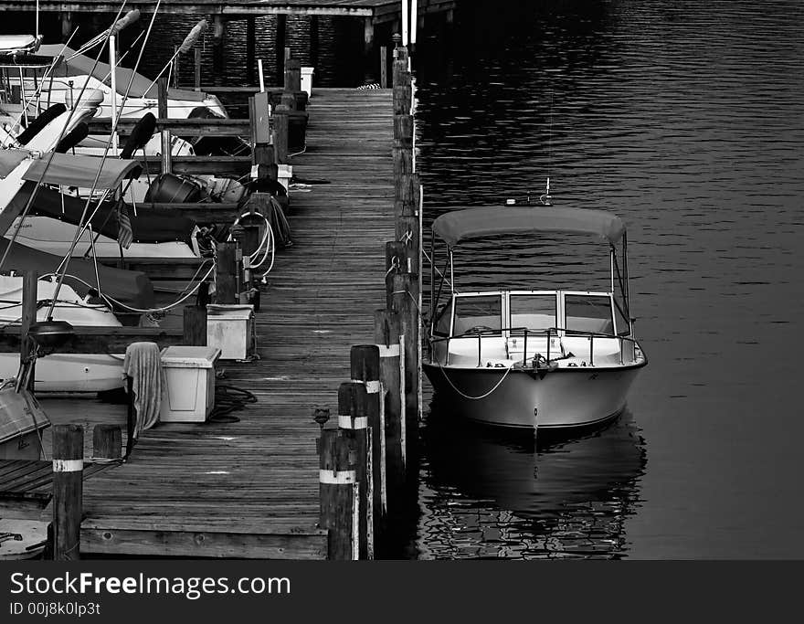 Docked white boat with canopy