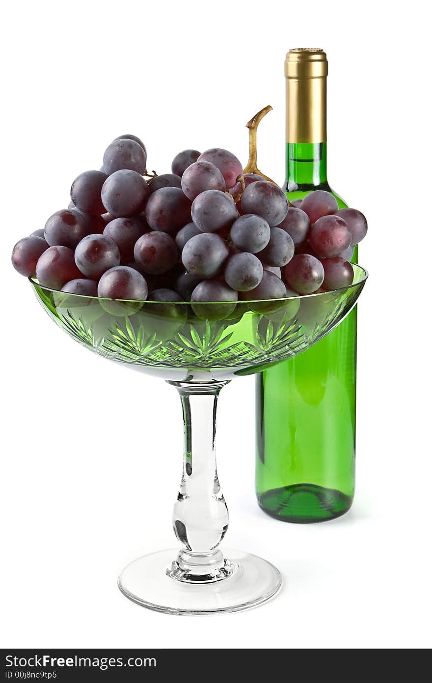 Grapes and bottle