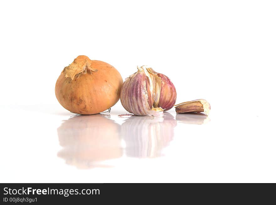 Garlic and onion isolated on white