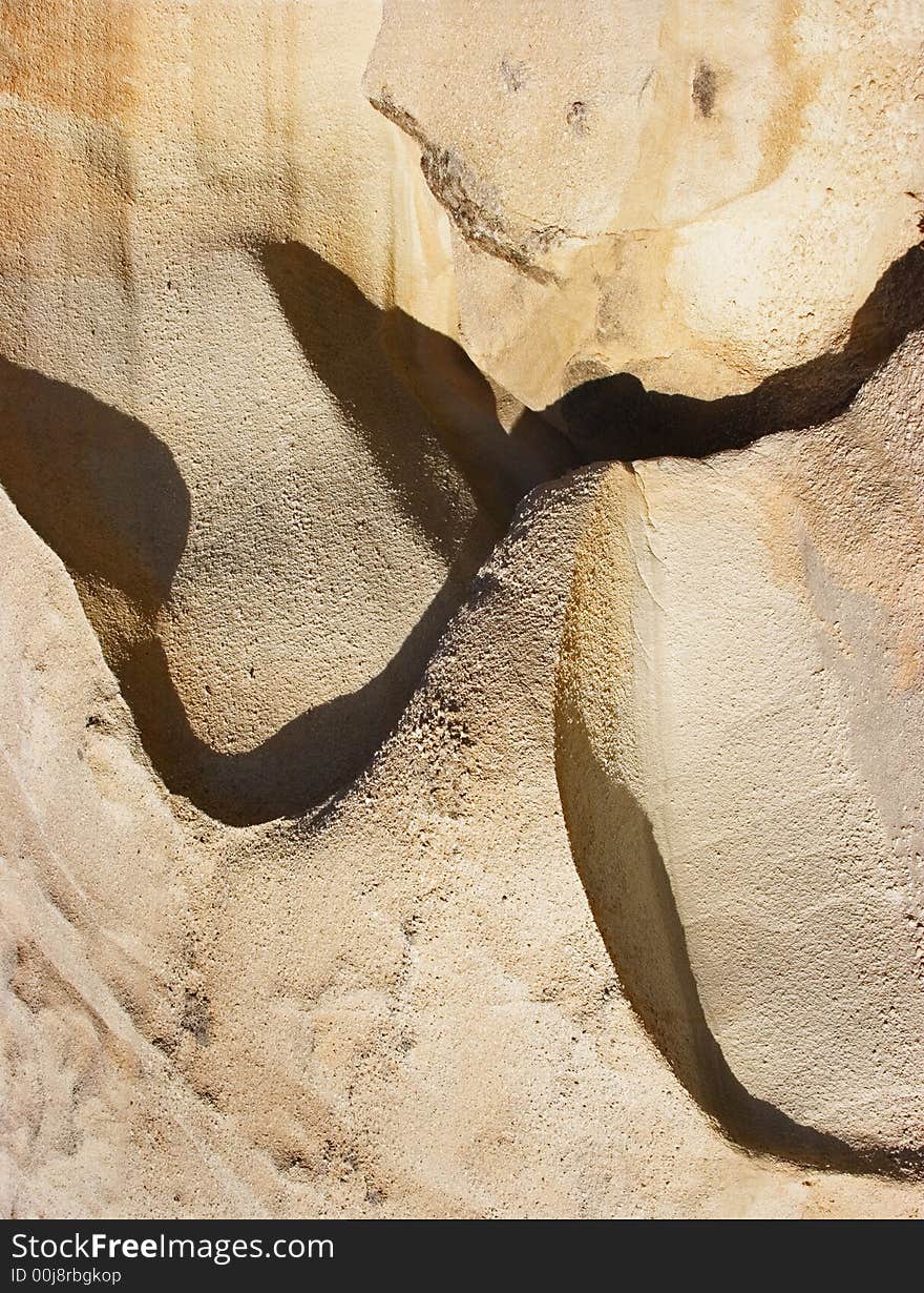 Rocky man, sun and shadow, face