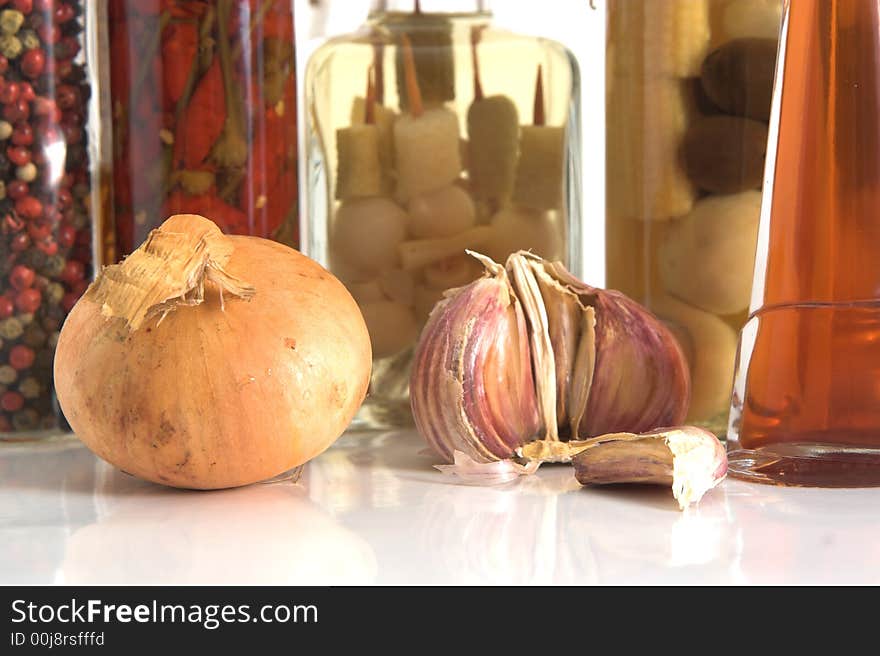 Jars of Spices and Garlic and Onion