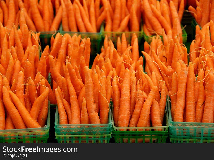 A display of carrots at an outdoor market in Ottawa, Canada. A display of carrots at an outdoor market in Ottawa, Canada