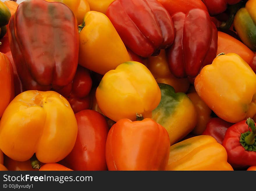 A disply of red an yellow peppers at an outdoor market in Ottawa, Canada. A disply of red an yellow peppers at an outdoor market in Ottawa, Canada