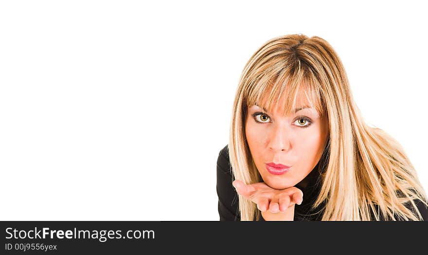 Young girl sending a kiss