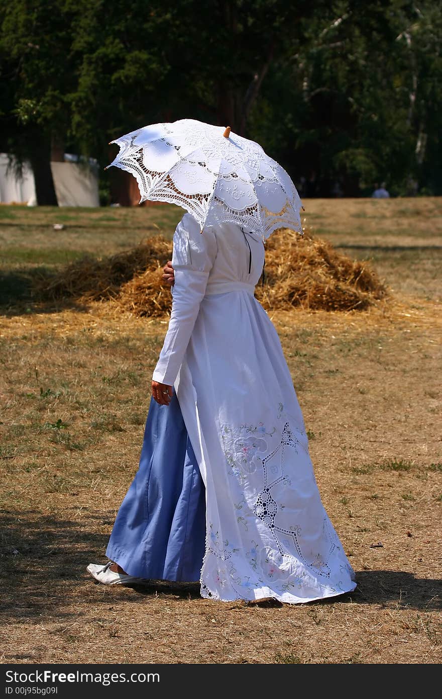 Woman at a War of 1812 battle re-enactment walking. Woman at a War of 1812 battle re-enactment walking