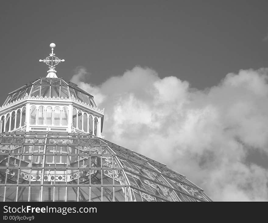 Top of the victorian Palm House in Sefton Park, Liverpool with sunlight reflected off the metalwork. Top of the victorian Palm House in Sefton Park, Liverpool with sunlight reflected off the metalwork.