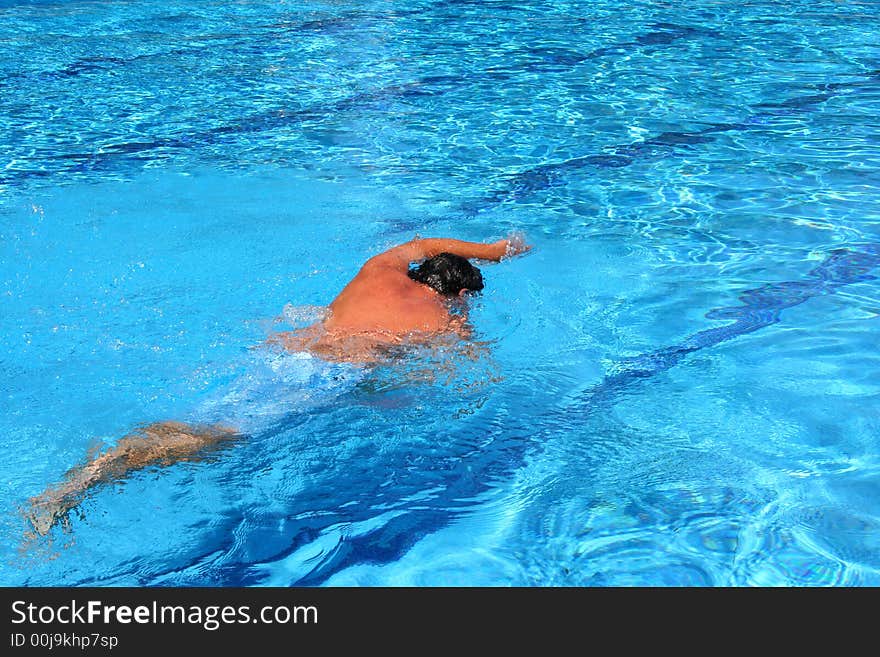 Young man in the swimming pool. Young man in the swimming pool