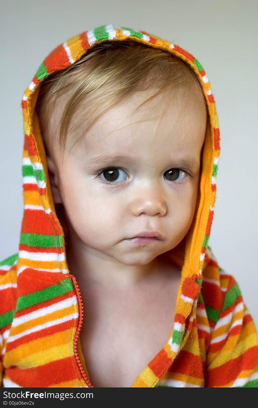 Image of cute toddler wearing a hooded jacket