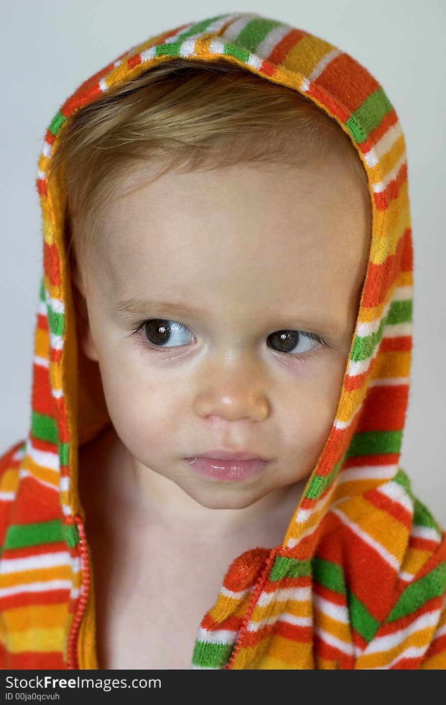 Image of cute toddler wearing a hooded jacket