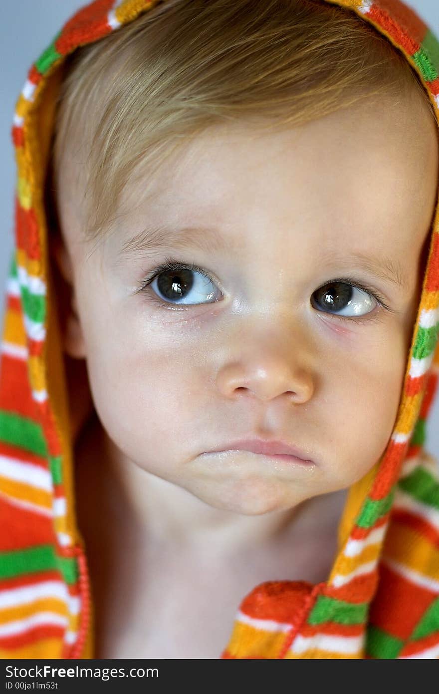 Image of cute toddler wearing a hooded jacket