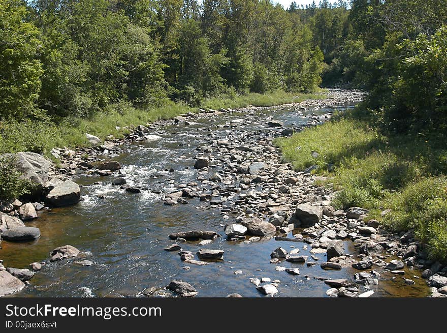 Fast flowing water in rural New Hampshire mountains. Fast flowing water in rural New Hampshire mountains