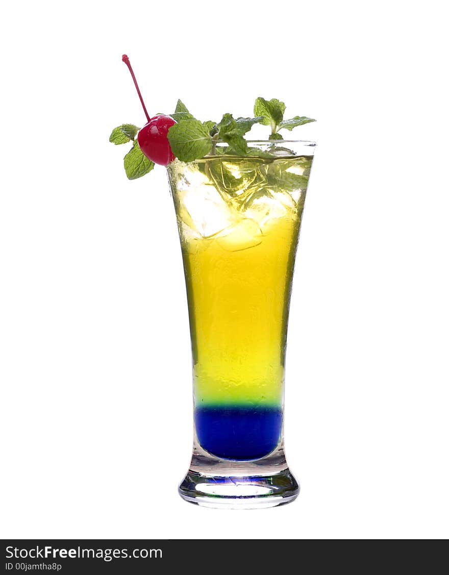 Colorful alcoholic cocktail in a tall glass against white background. Colorful alcoholic cocktail in a tall glass against white background