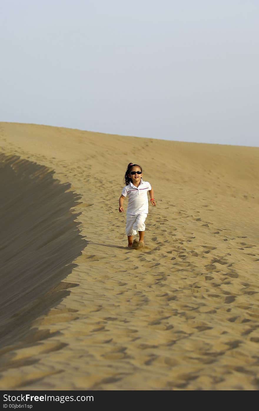 Happy child in desert