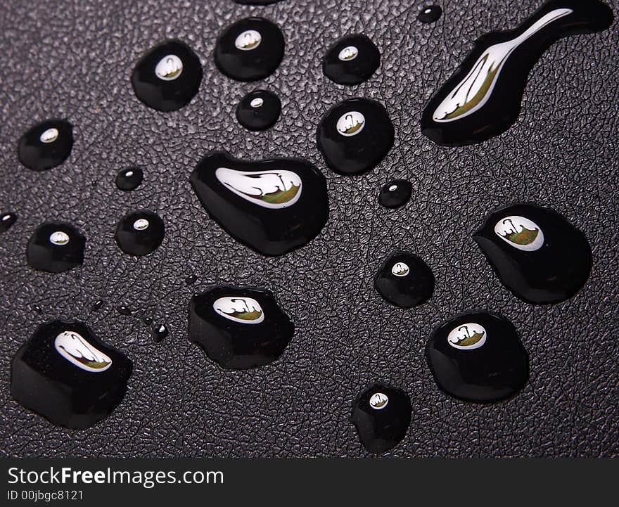 Reflection of a umbrella in a drop. Reflection of a umbrella in a drop