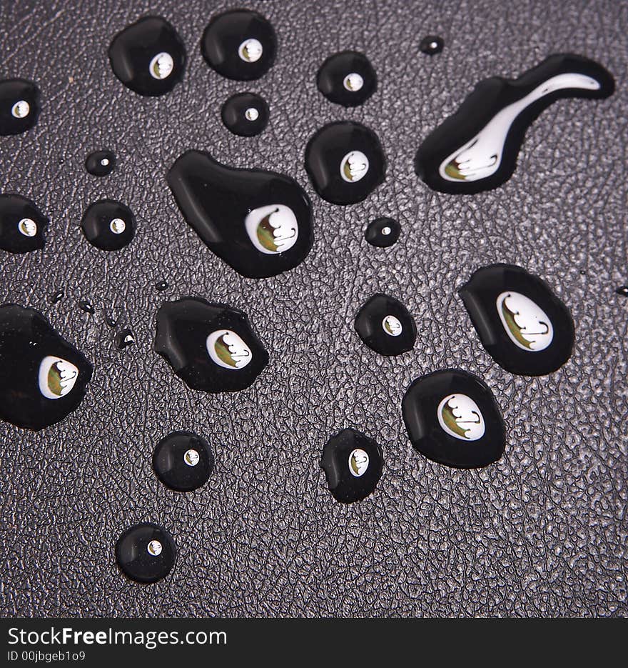 Reflection of a umbrella in a drop. Reflection of a umbrella in a drop