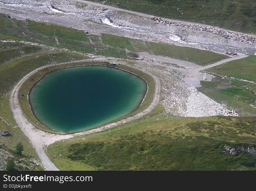 Mountains view with lake from Hintertux glacier in Austrian Tirol. Mountains view with lake from Hintertux glacier in Austrian Tirol