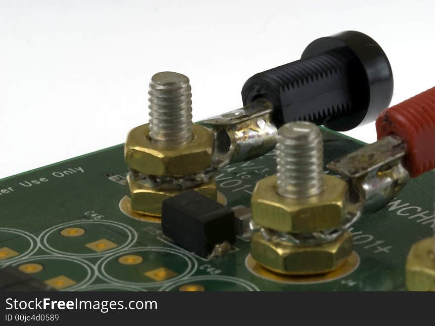 Close up detail of a Printed Circuit Board on a white background