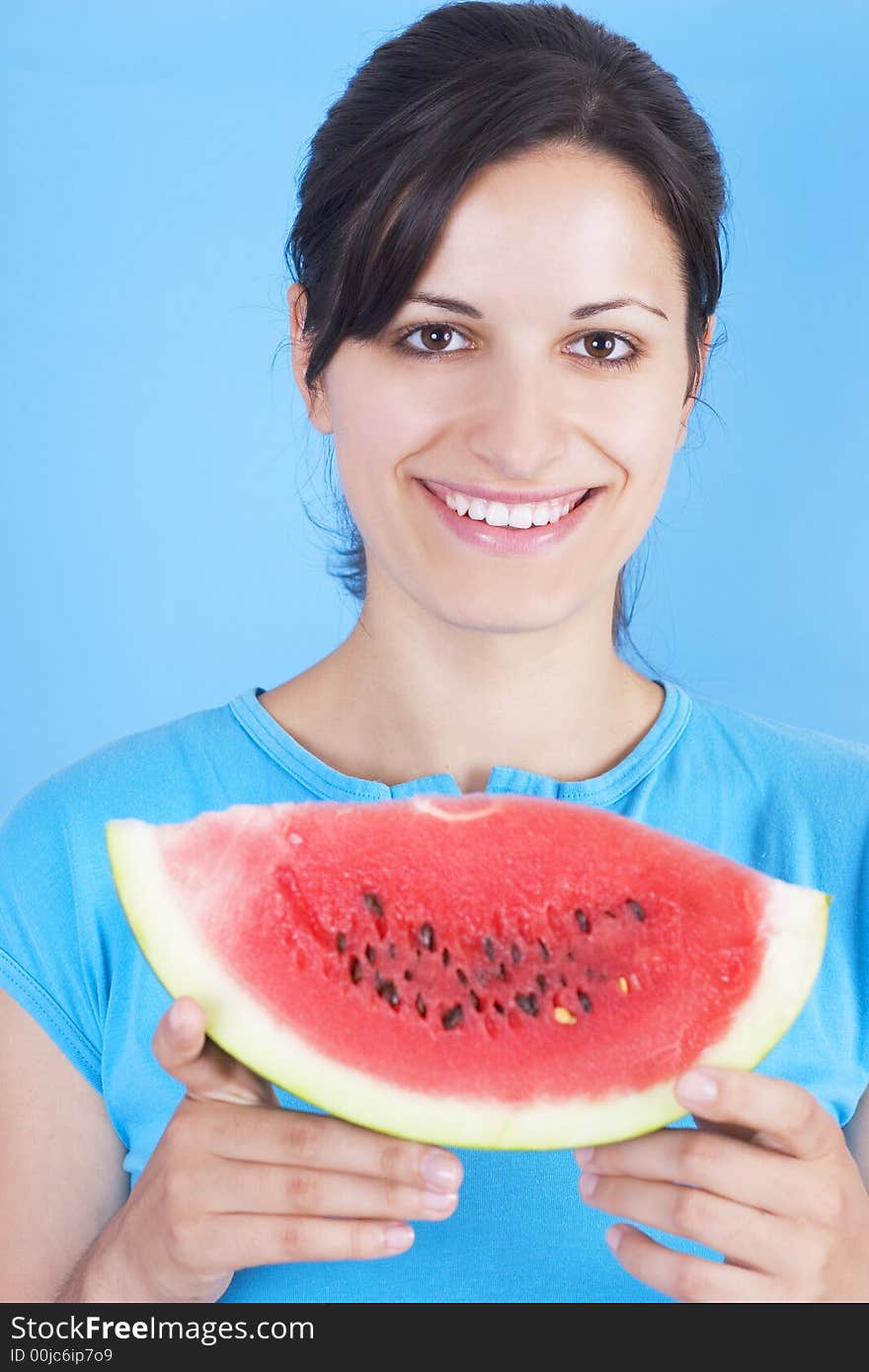 Young girl  with watermelon isolated on blue background. Young girl  with watermelon isolated on blue background