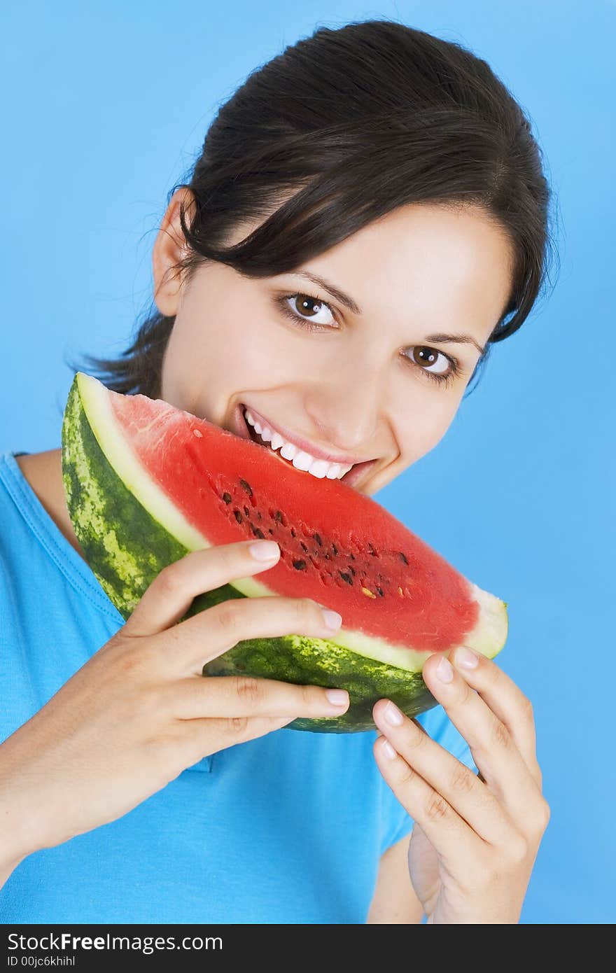 Young girl  with watermelon isolated on blue background. Young girl  with watermelon isolated on blue background