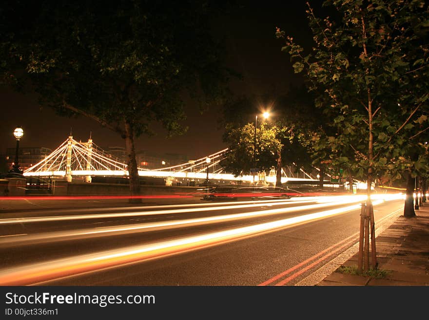 This picture was taken using a slow shutter speed on my canon 400d camera ,the trailing car lights look good against the well lit bridge. This picture was taken using a slow shutter speed on my canon 400d camera ,the trailing car lights look good against the well lit bridge