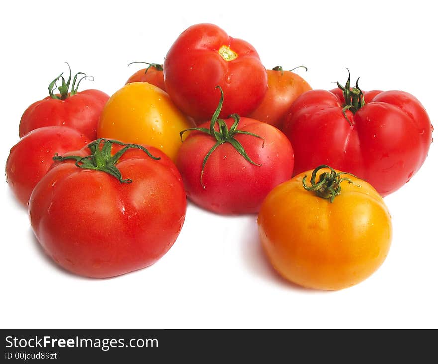 Tomatoes on white background, close up