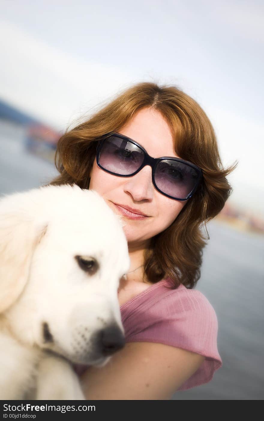Woman close up portrait with dog outdoor. Woman close up portrait with dog outdoor