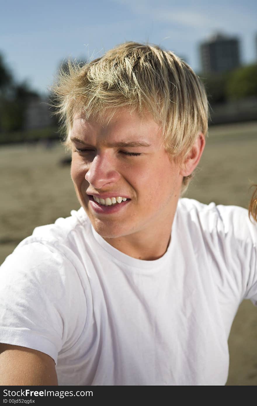 Man close up portrait over beach and sky