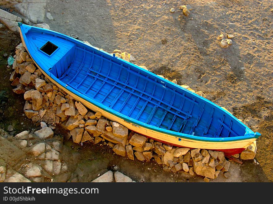 Fishing boat on a dry land