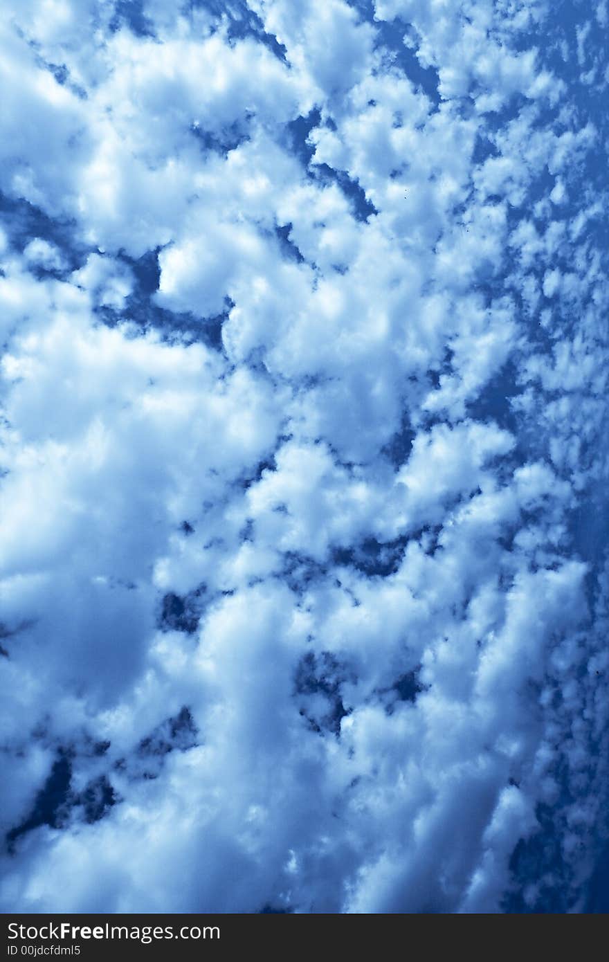 Fantastic vibrant-blue texture of storm sky. Fantastic vibrant-blue texture of storm sky