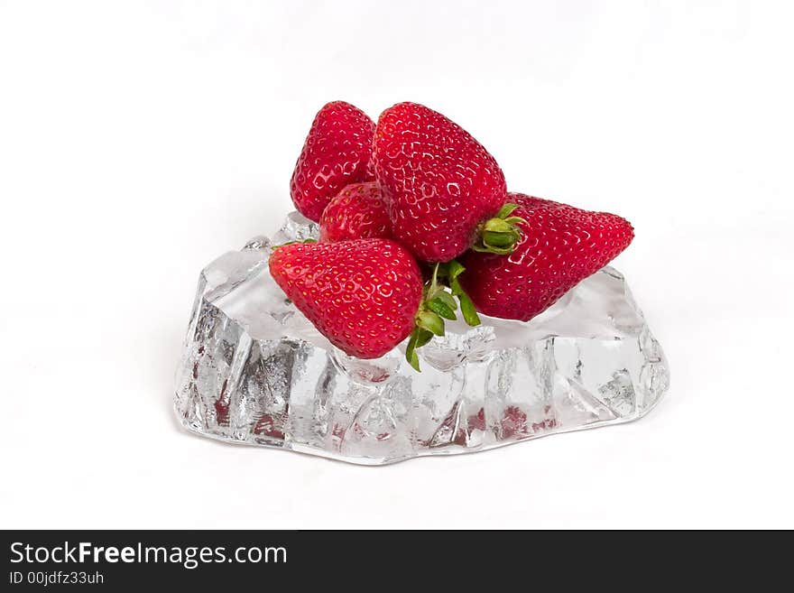 Fresh ripe red strawberries on ice