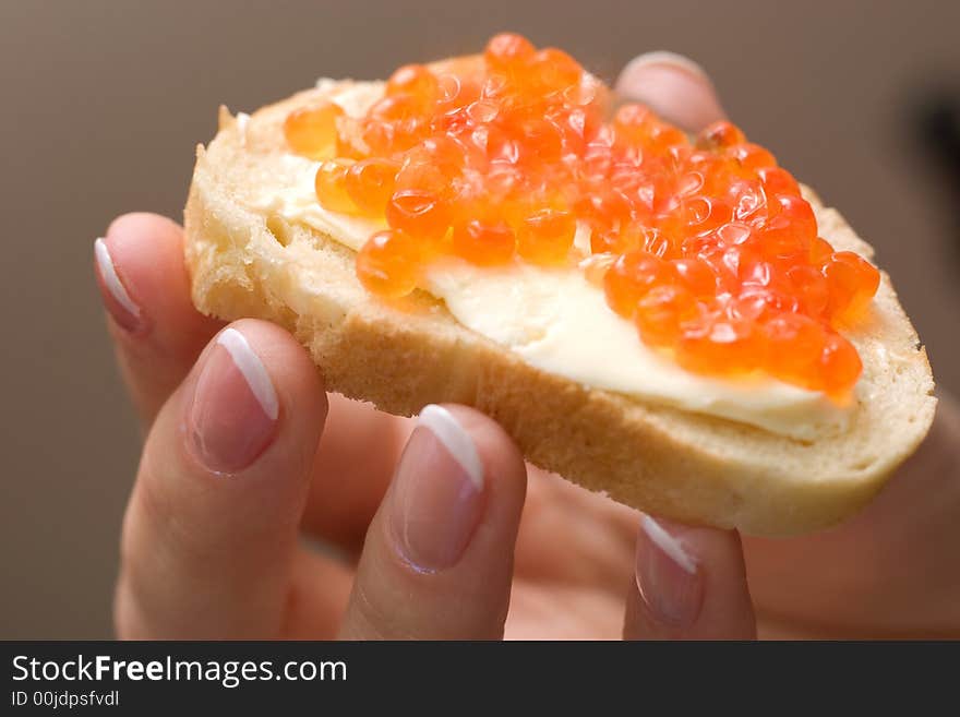 Fresh and tasty sandwich with red caviar