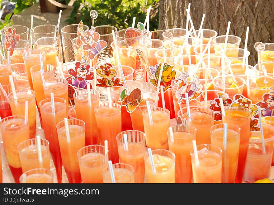 Red - orange cocktails in glases