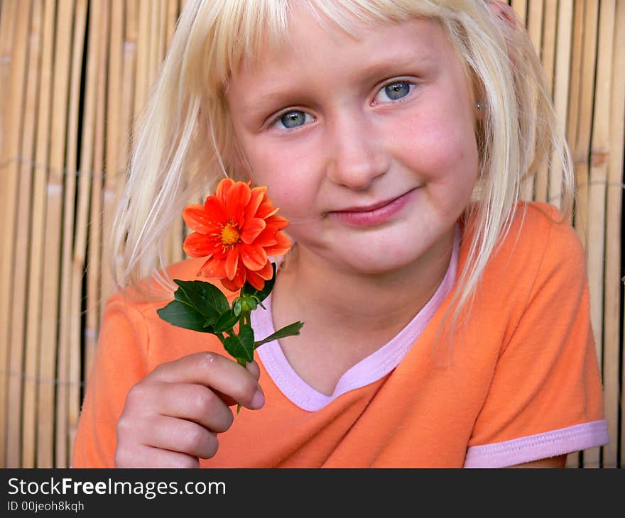 The girl with a flower.