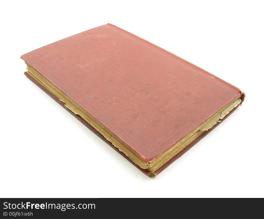 A red antique book with pages that have started to fringe on the edges and yellow. A red antique book with pages that have started to fringe on the edges and yellow.