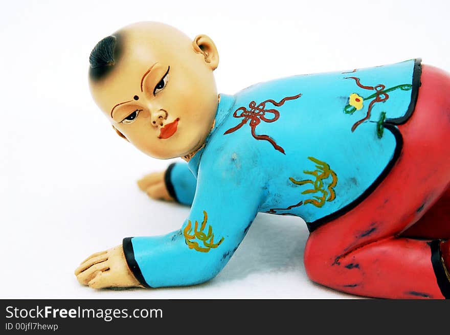 Small chinese figurine in white background. Small chinese figurine in white background