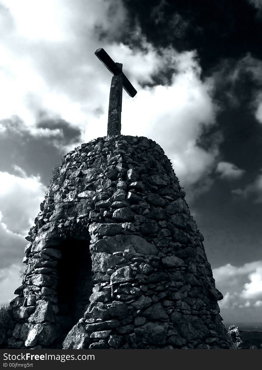 Cross on top of a rough construction