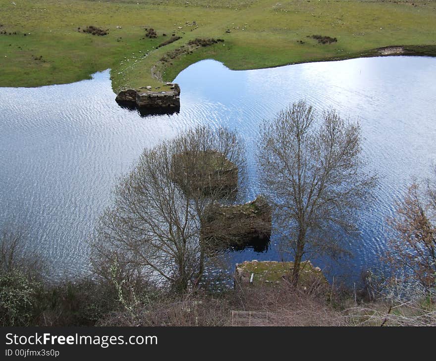 Quiet riverside landscape with a broken bridge. Quiet riverside landscape with a broken bridge