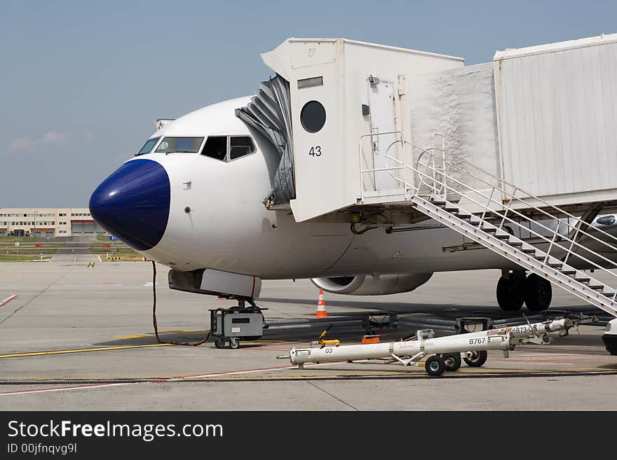 Airplane standing on the airport. Airplane standing on the airport